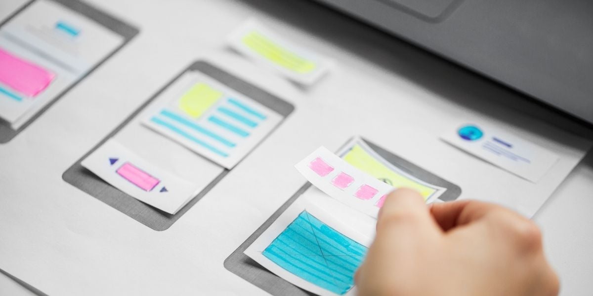 A web designer creating a mobile-first website layout
