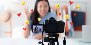 A woman filming a live video for social media