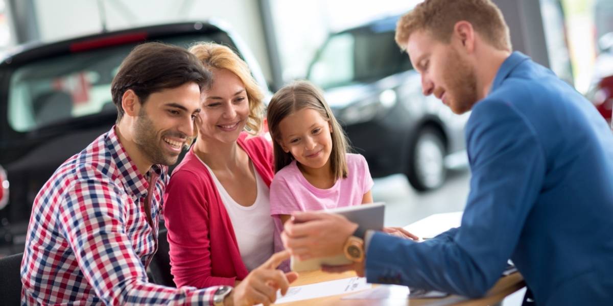 family brought into a car dealership because of local seo